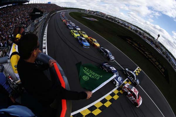 Kevin Harvick, driver of the #29 t, and Ricky Stenhouse Jr., driver of the #17, lead the field past the green flag to start the NASCAR Sprint Cup Series 13th Annual Hollywood Casino 400 at Kansas Speedway on October 6, 2013 in Kansas City, Kansas. Kevin Harvick, driver of the #29 t, and Ricky Stenhouse Jr., driver of the #17, lead the field past the green flag to start the NASCAR Sprint Cup Series 13th Annual Hollywood Casino 400 at Kansas Speedway on October 6, 2013 in Kansas City, Kansas.