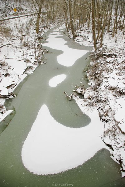 Big Lynn Creek had frozen over during the storm. It had also risen above
its banks, due to the large quantity of water being released from the
East Lynn damn, located upstream. Big Lynn Creek had frozen over during the storm. It had also risen above
its banks, due to the large quantity of water being released from the
East Lynn damn, located upstream.