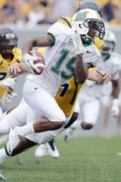 Mountaineers, Mother Nature Top Herd 34-13 in Coal Bowl; Booker rips off 87-yard punt return for touchdown Booker runs for 87 yard TD Courtesy MU