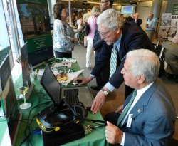 Dr. Kopp Delivers Marshall State of University Address in Washington, D.C. Dr. Tony Szwilski demonstrates a simulationof a large mine fire safety response to Rep. Nick Rahall (Photo Provided by MU)
