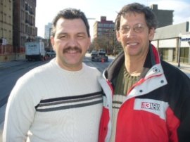 Heroic Fire Fighter to be Sworn in as Huntington Fire Chief Carl Eastham (left) and reporter Dee Delancy at Emmons Memorial Service