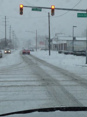 Huntington Orders More Salt, Removal Well Within Budget At 9 a.m., snow covered 8th Avenue/20th Street