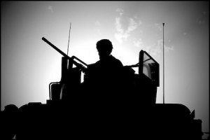 OP-ED: How Hawkish Are Americans? U.S. Army gunner during a mission in Afghanistan. Credit: Flickr/Zoriah.
