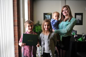 Children of deceased Marine veteran receive RBA degree he was pursuing at Marshall University Owen Moul's children pose with their dad's diploma they received today from Marshall University. From left to right are Owen Jr., 7, holding the diploma; Sierra, 8, Zane, 1, and Sydney, 14. Photo by Liu Yang/Marshall University.