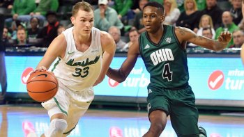 MU Men's Basketball Team Prevails in OT MU Men's Basketball Team Prevails in OT