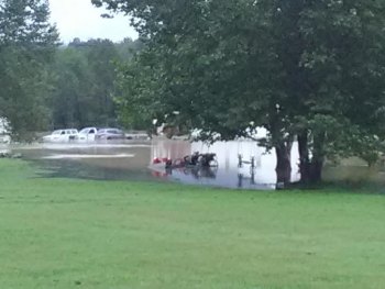 Flood Watch Continues People Trapped Along this portion of 124 per Facebook