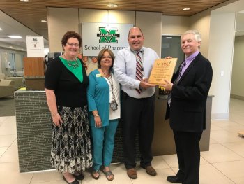 Marshall School of Pharmacy assistant professor receives award from National Community Pharmacists Association Marshall School of Pharmacy assistant professor receives award from National Community Pharmacists Association