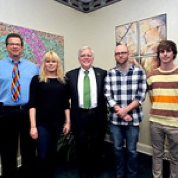 Marshall Announces Winners in holiday design contest Byron Clercx; student Emma Nilsson; President Kopp; and students Doug Hawley and John Fowler. Hawley won the plate design competition while Nilsson's group was third in the video competition.