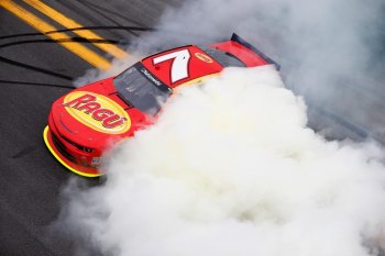 Regan Smith edges Brad Keselowski by .013 seconds to win NNS race at Daytona Regan Smith, driver of the #7 Ragu Chevrolet, celebrates with a burnout after winning the NASCAR Nationwide Series DRIVE4COPD 300 at Daytona International Speedway on February 22, 2014 in Daytona Beach, Florida.