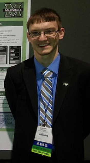 Marshall senior receives scholarship from meteorology society Marshall University senior Shawn Cheeks, who has received a scholarship from the American Meteorological Society, is shown presenting a poster at the society's 2014 conference in Atlanta.