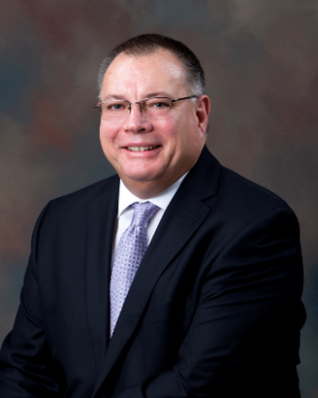McGuire Awarded CCIM Designation in Atlanta McGuire Awarded CCIM Designation in Atlanta