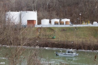 The Complete Guide To Everything That’s Happened Since The Massive Chemical Spill In West Virginia An environmental enforcement boat patrols in front of the chemical spill at Freedom Industries.