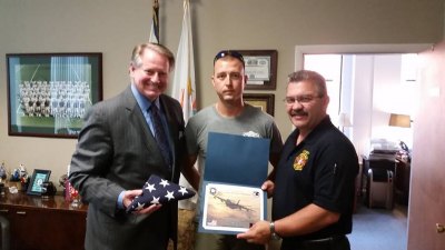 Huntington Firefighter Donates Combat Flag Huntington Firefighter Donates Combat Flag