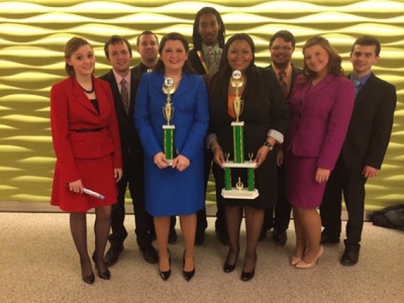 Thundering Word finishes third in tournament at Eastern Michigan Members of the Thundering Word, Marshall University's speech and debate team, pose with their trophies after a solid third-place finish last weekend in the Tower Invitational at Eastern Michigan University.