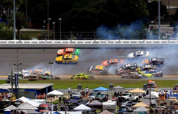 Driving iconic No. 43 car, Almirola nabs first career win in rain-shortened Daytona race DAYTONA BEACH, FL - JULY 06: A large incident occurs in turn three during the NASCAR Sprint Cup Series Coke Zero 400 at Daytona International Speedway on July 6, 2014 in Daytona Beach, Florida.