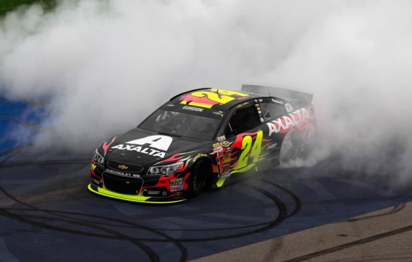 Late Restart Catapults Gordon to Michigan Victory Jeff Gordon, driver of the #24 Axalta Chevrolet, celebrates with a burnout after winning the NASCAR Sprint Cup Series Pure Michigan 400 at Michigan International Speedway on August 17, 2014 in Brooklyn, Michigan.