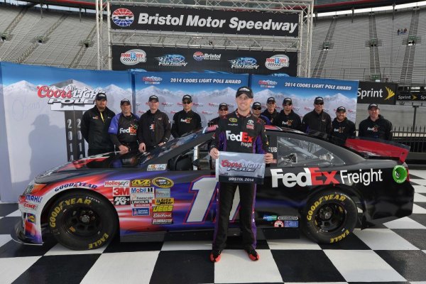 Record qualifying run puts Hamlin back on track at Bristol Denny Hamlin, driver of the #11 FedEx Freight Toyota, celebrates winning the pole position after qualifying for the NASCAR Sprint Cup Series Food City 500 at Bristol Motor Speedway on March 14, 2014 in Bristol, Tennessee.