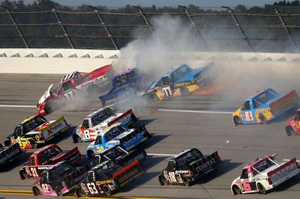 NCWTS Recap: Johnny Sauter avoids wild wreck to win Talladega truck race Timothy Peters, driver of the #17 , Caleb Homan, driver of the #75 , and German Quiroga, driver of the #77 , crash on track during the Camping World Truck Series Fred's 250 at Talladega Superspeedway on October 19, 2013 in Talladega, Alabama.