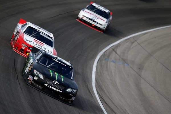 NASCAR: Kyle Busch dominates Chicagoland to set up try for weekend sweep JOLIET, IL - Kyle Busch, driver of the #54 Monster Energy Toyota, leads Sam Hornish Jr., driver of the #12 Wurth Ford, during the NASCAR Nationwide Series Dollar General 300 at Chicagoland Speedway on September 14, 2013 in Joliet, Illinois.