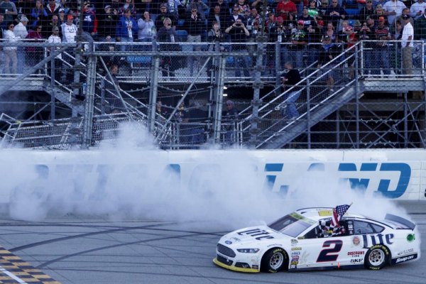 Bold late-race move sets up Keselowski's win in first Chase event Brad Keselowski, driver of the #2 Miller Lite Ford, celebrates with a burnout after winning the NASCAR Sprint Cup Series MyAFibStory.com 400 at Chicagoland Speedway on September 14, 2014 in Joliet, Illinois.