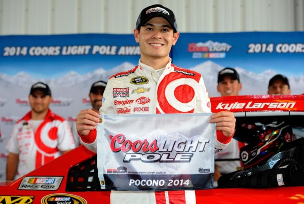 Kyle Larson Becomes First NASCAR Drive for Diversity Graduate To Win NASCAR Sprint Cup Series Coors Light Pole Kyle Larson, driver of the #42 Target Chevrolet, poses with the Coors Light Pole Award after qualifying for the NASCAR Sprint Cup Series GoBowling.com 400 at Pocono Raceway on August 1, 2014 in Long Pond, Pennsylvania.